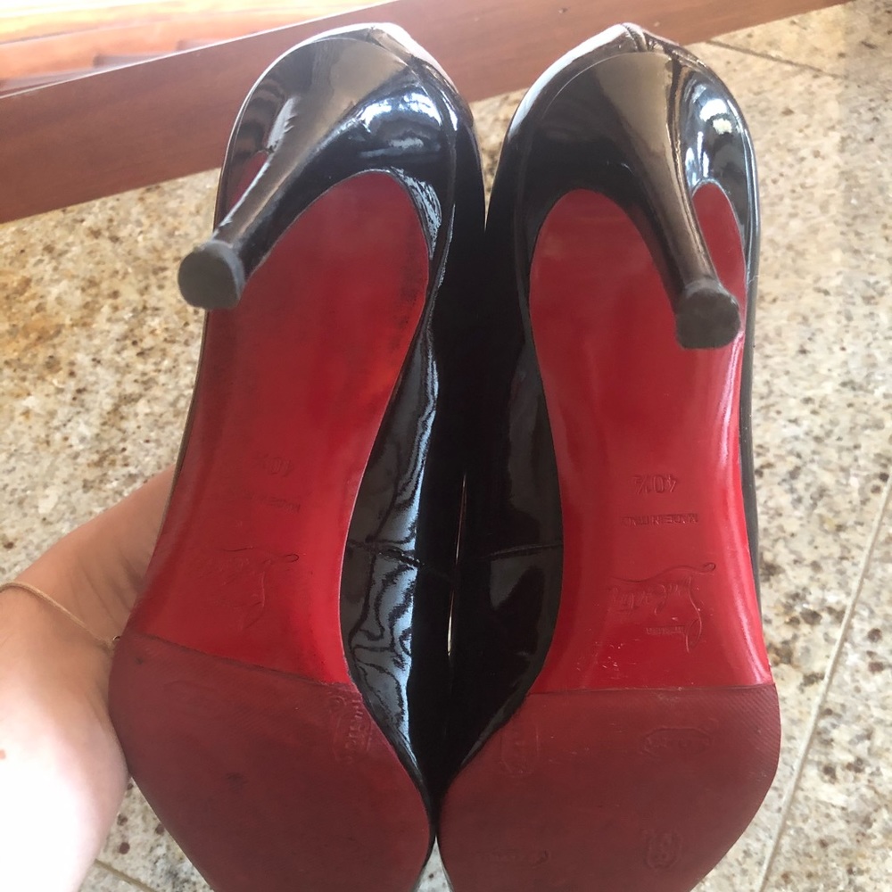 Used black patent Louboutin Pigalle